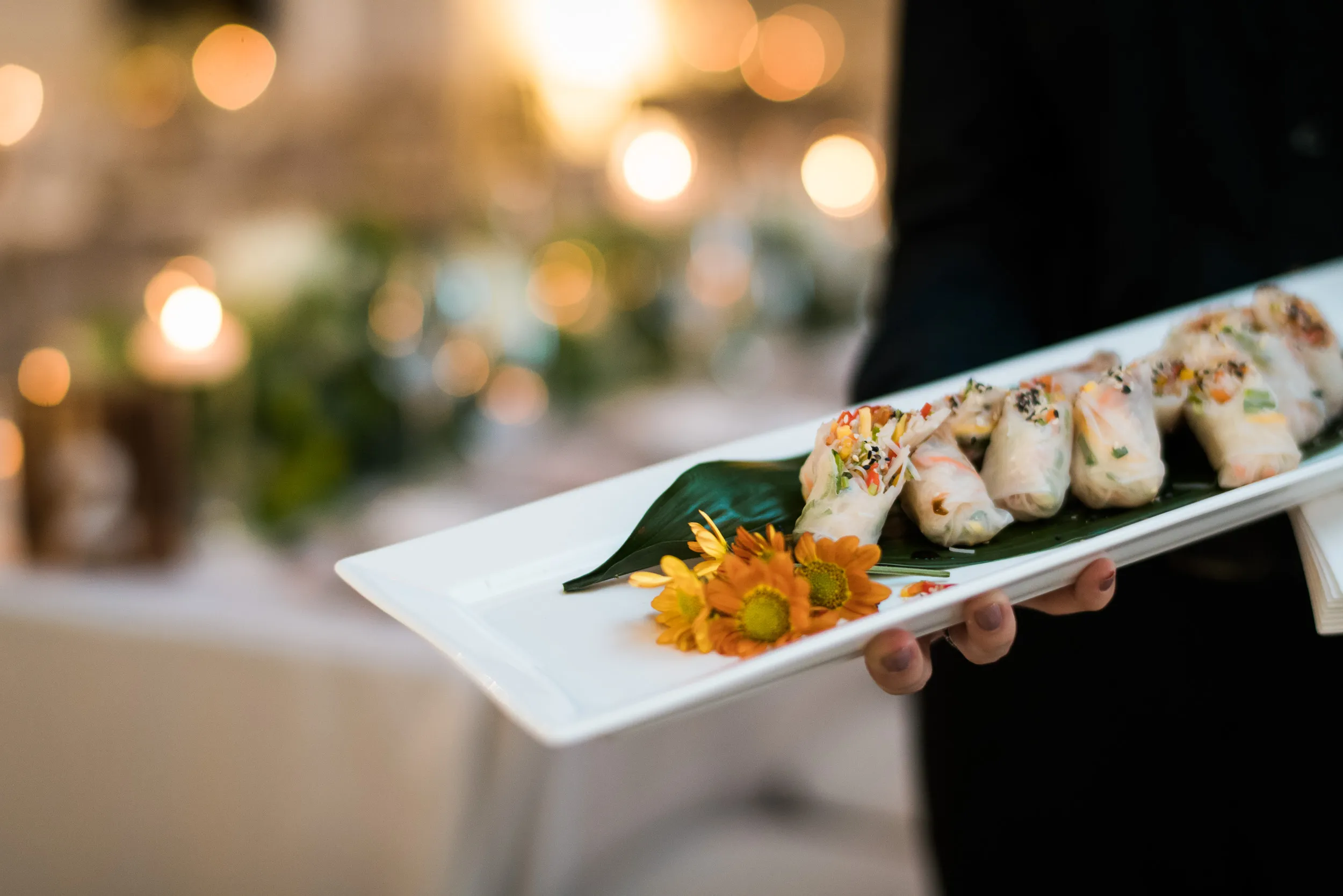 Catering service presenting gourmet appetizers